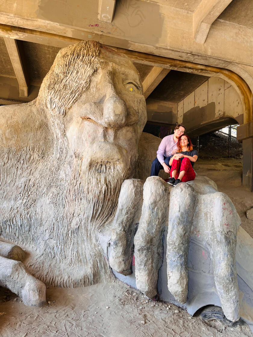Me and my partner on the Fremont Troll's hand